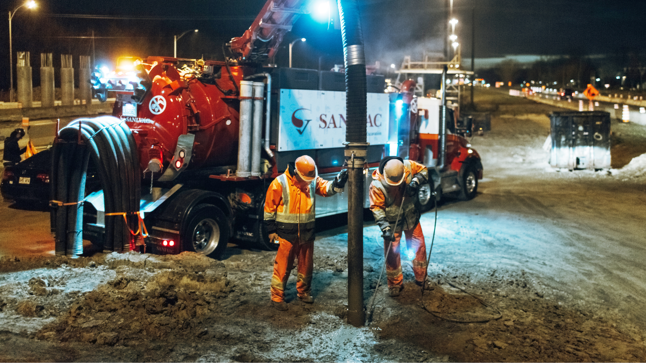 Operators in action on a hydro excavation worksite